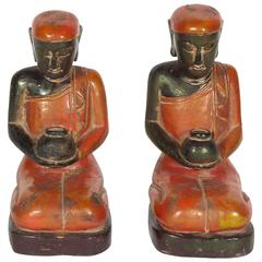 Pair of Kneeling Monk Sculptures