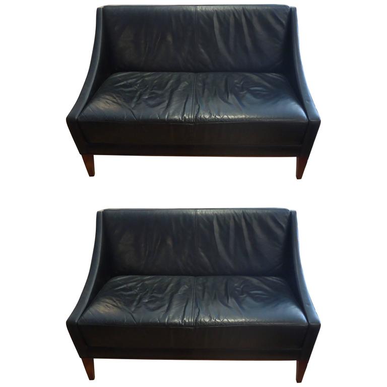 Pair of Sleek MidCentury Modern Black Leather Loveseats at 1stDibs