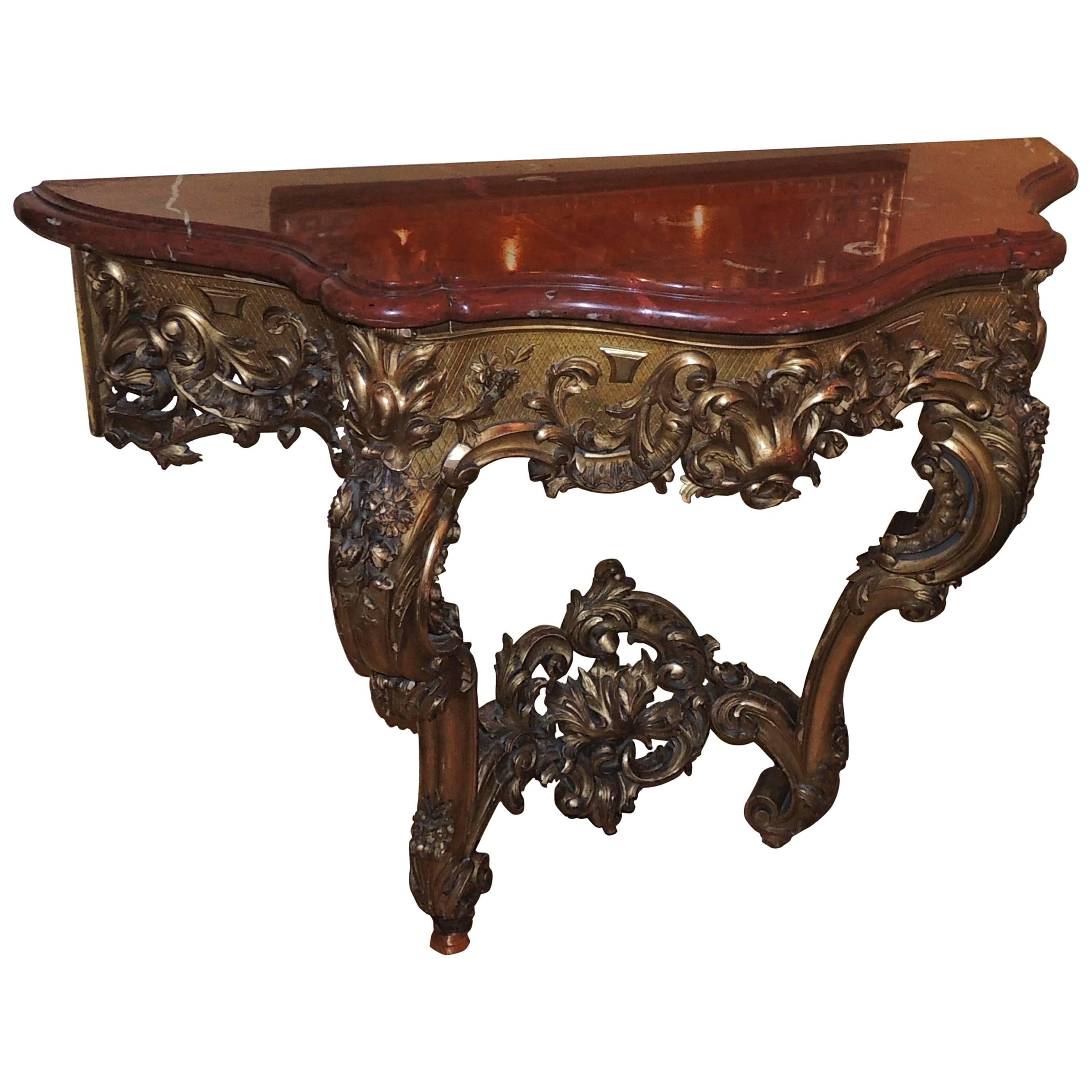 Elegant French 19th Century Carved Giltwood Console with Rouge Marble Top For Sale