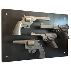 Four Cast Aluminum Pistol Set