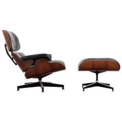 Charles and Ray Eames Rosewood Lounge Chair and Ottoman, circa 1960