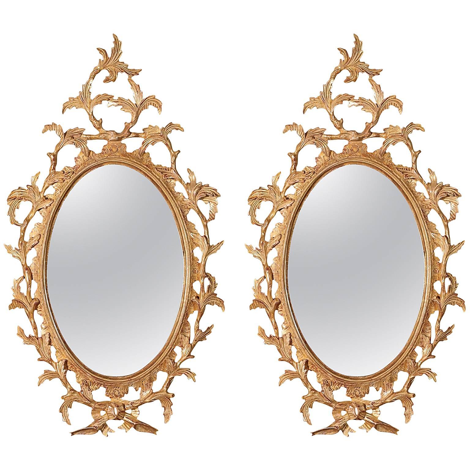 Pair of Small Chippendale Oval Mirrors in the manner of Thomas Chippendale For Sale