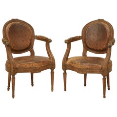 French Louis XVI Style Armchairs in Original Leather with Unusual Fleur de Lis