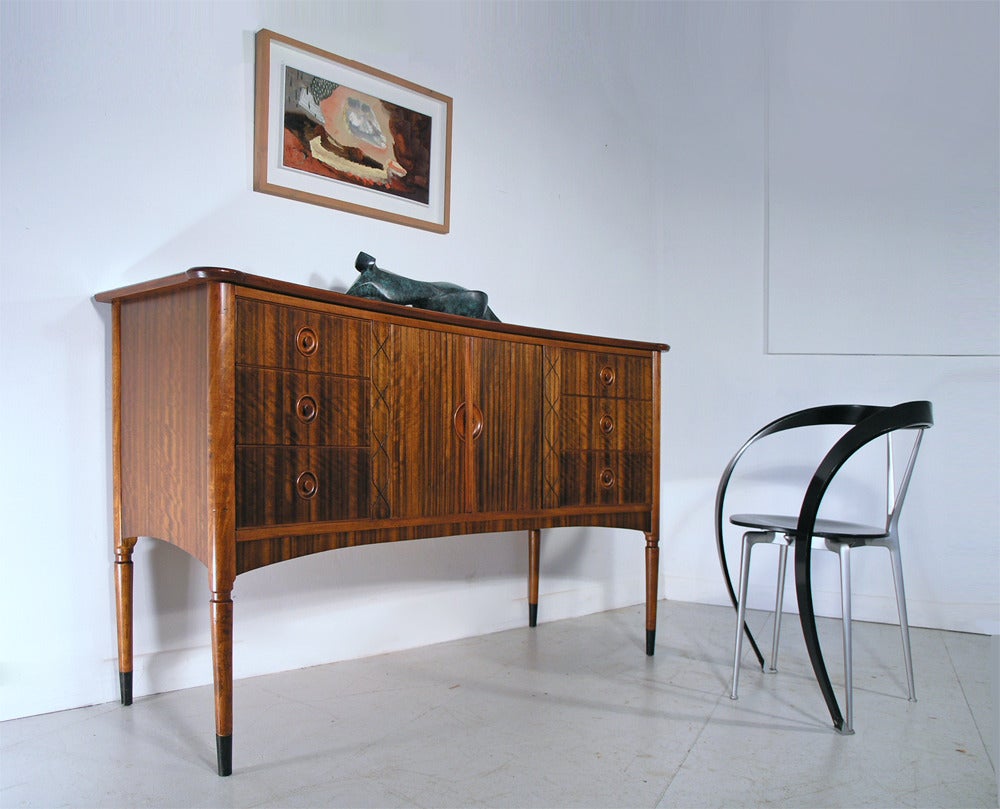Walnut sideboard with tambour doors and six drawers, 1950s.  Fully re-polished.