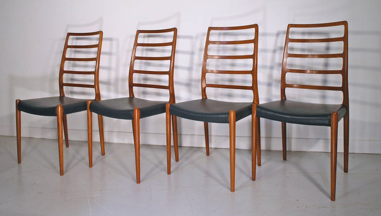 4 Moller #82 teak and leather dining chairs