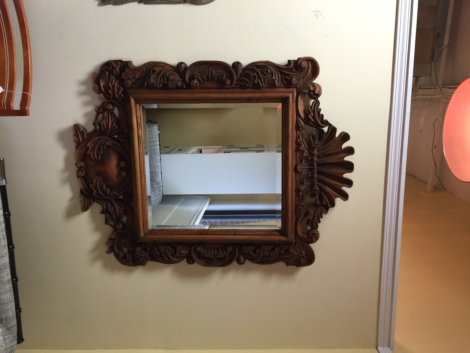 This large mirror is in great vintage condition with no flaws. The mirror is beveled. The hand carving is amazing. I am honestly guessing at the date of its creation, it is an old piece with no markings.