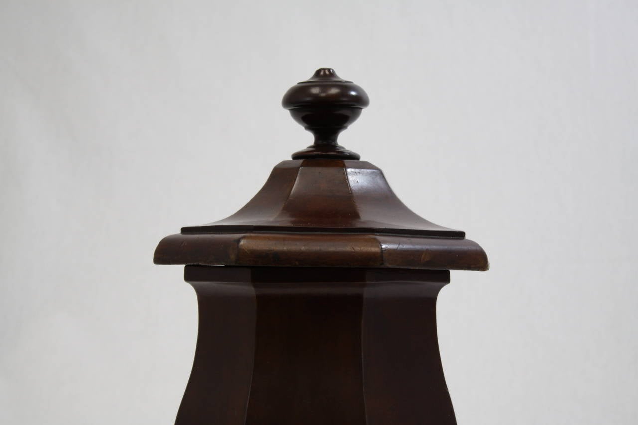 19th century German Biedermeier tobacco jar made of walnut and turned. Top reaches a commanding crown top. Very unique. Eight sided.