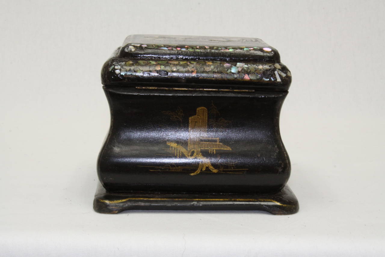 Wonderful Asian tea caddy covered in chinoiserie and inlay mother-of-pearl. This caddy has a single compartment. Dates 1860-1870, England.