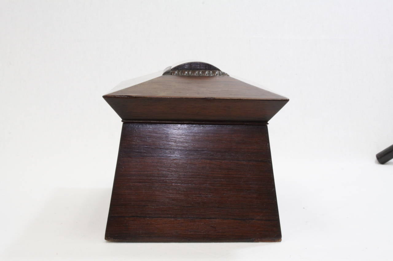 1860 rosewood sarcophagus shaped George III style tea caddy solid rosewood with brass key hole. Double compartments.