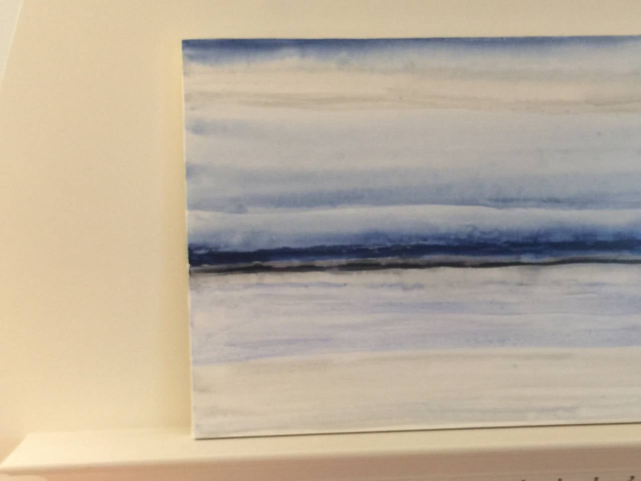 Signed and dated by Raleigh Artist Ellan Maynard, this painting is so titled because of its resemblance to shibori, the art of dying linen with indigo. The serene landscape contains black, indigo, silver, and blues and will be at home in a variety