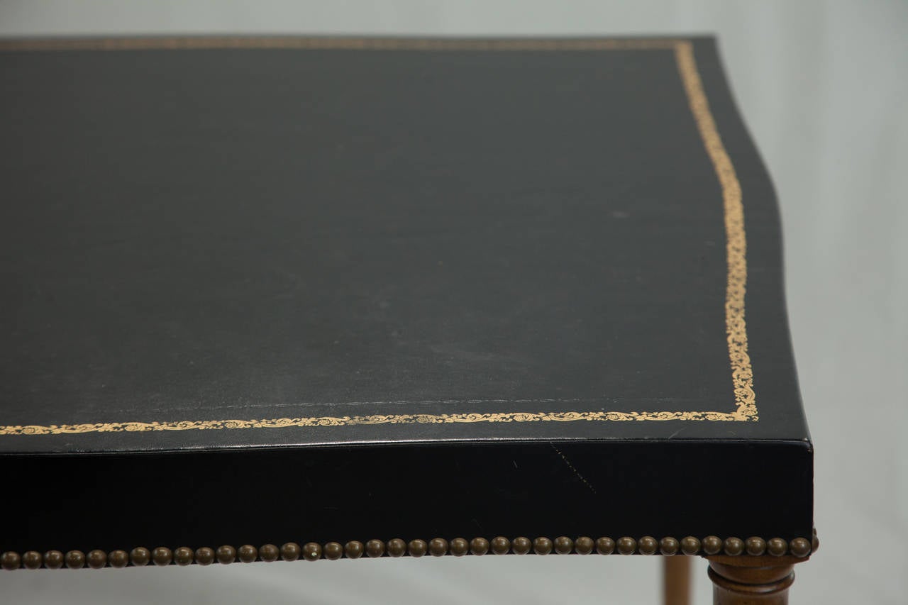 Gold Embossed Black Leather-Top Game Table with Nail Head trim and Bamboo style wooden legs.  Excellent Condition.  No Tears or cracks in wood or leather.