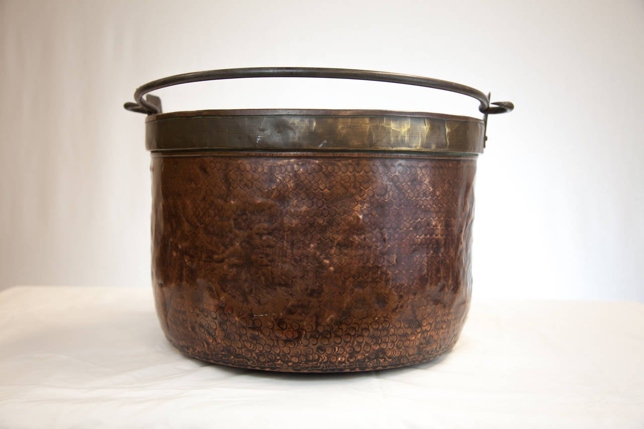 Hammered copper pot with hand forged handle

Item          Height    Width 
921A          13