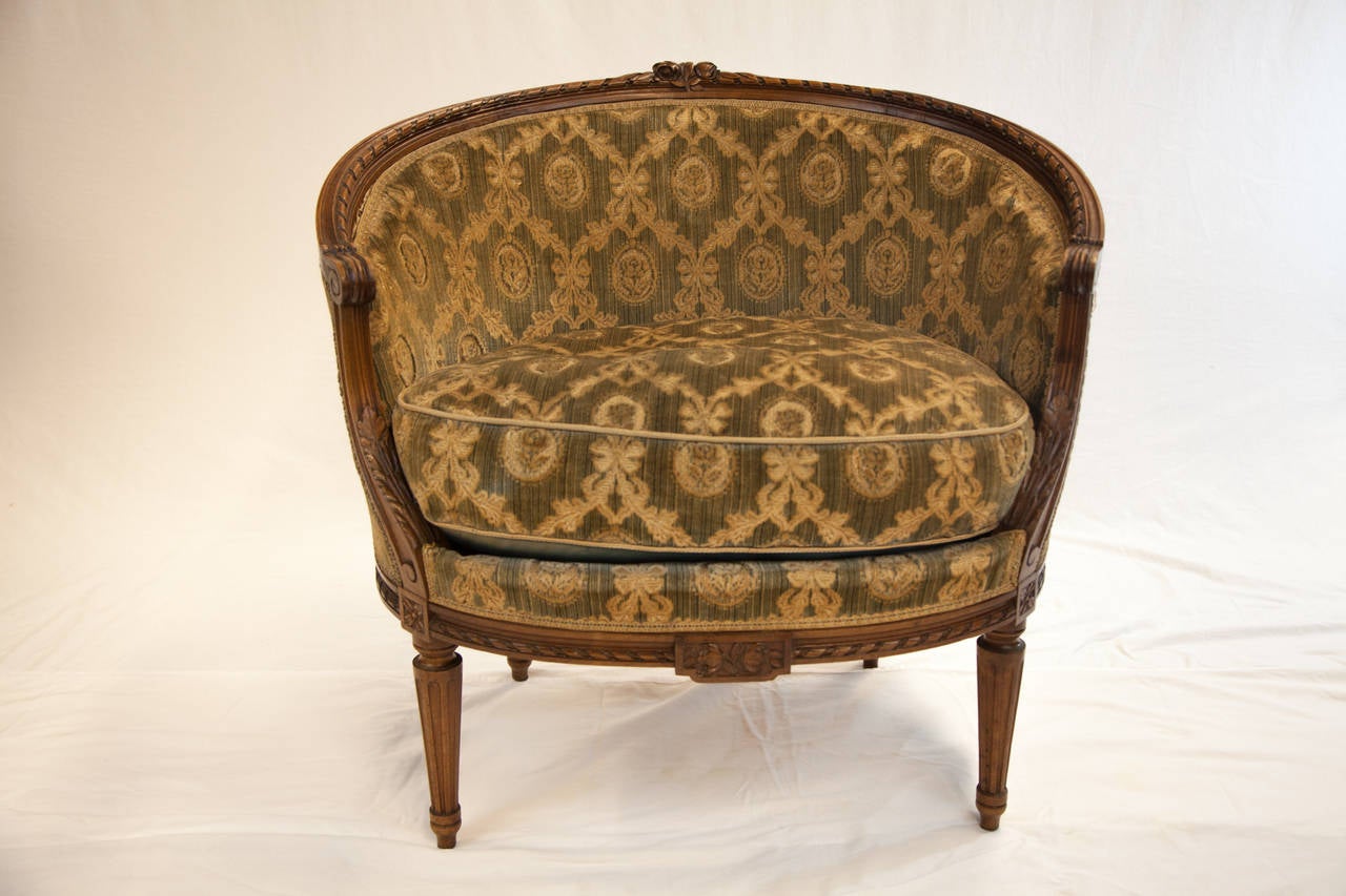 Pair of beautifully shaped Napoleon III Corbeille shaped Bergeres in Walnut.  Chairs are very solid, but upholstery needs updating.  Seat height is 19