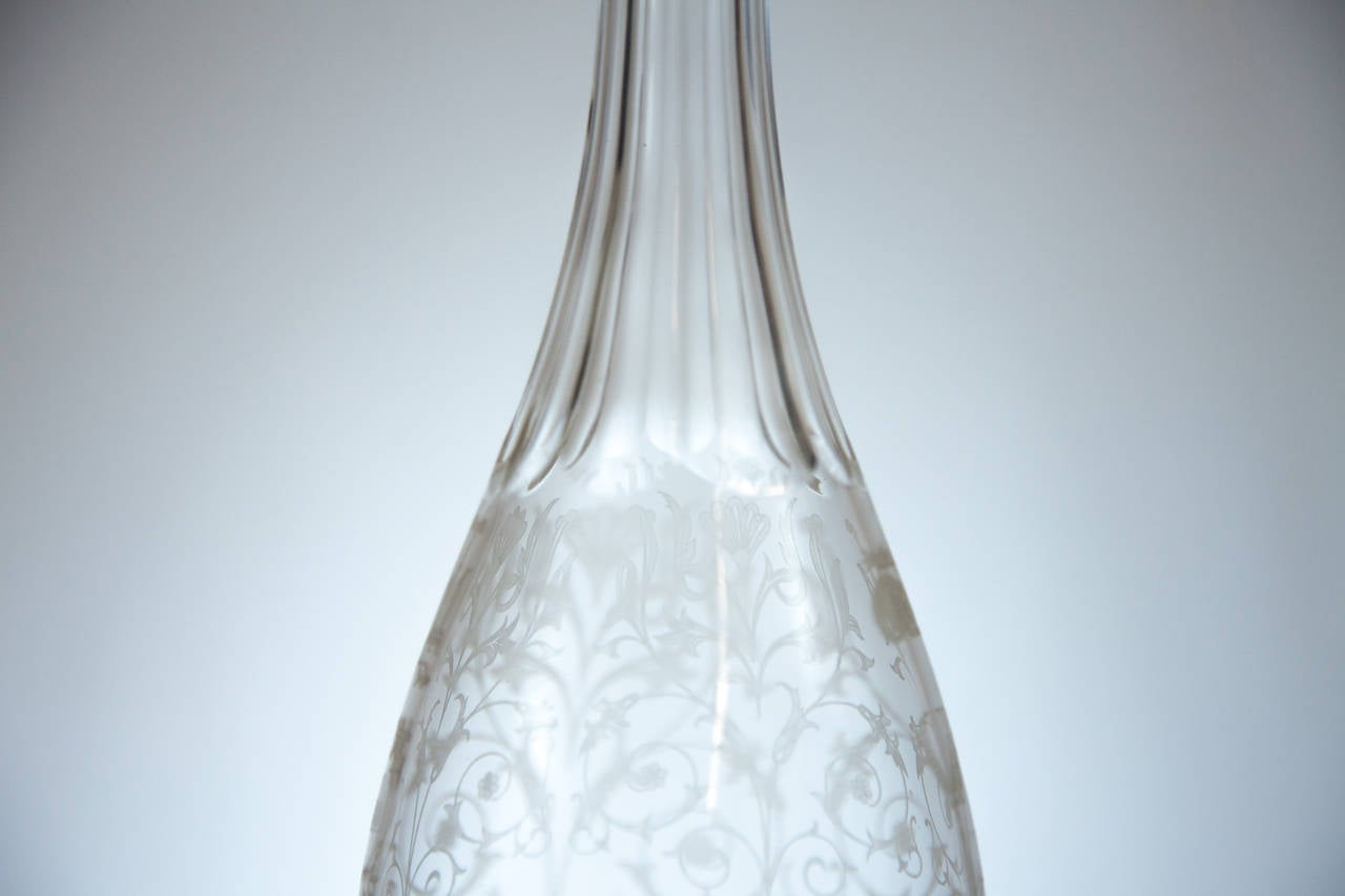 Signed Baccarat decanter of clear etched glass, circa 1920. Etched signature on the bottom.