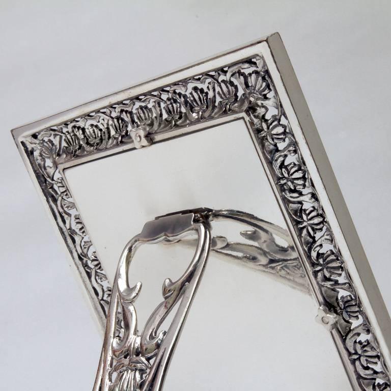 Trust is an Italian  photo frame  silver handmade  by Laura G Art with Heart. A stylized orange-flower design provides a well-wishing motif for Trust, a wonderful piece handmade with passion by Italian master of silver crafts. The detail is always