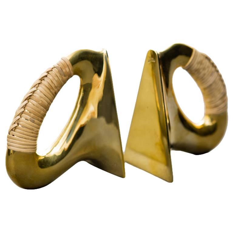 Pair of Carl Auböck Bookends in Polished Brass and Coiled with Cane