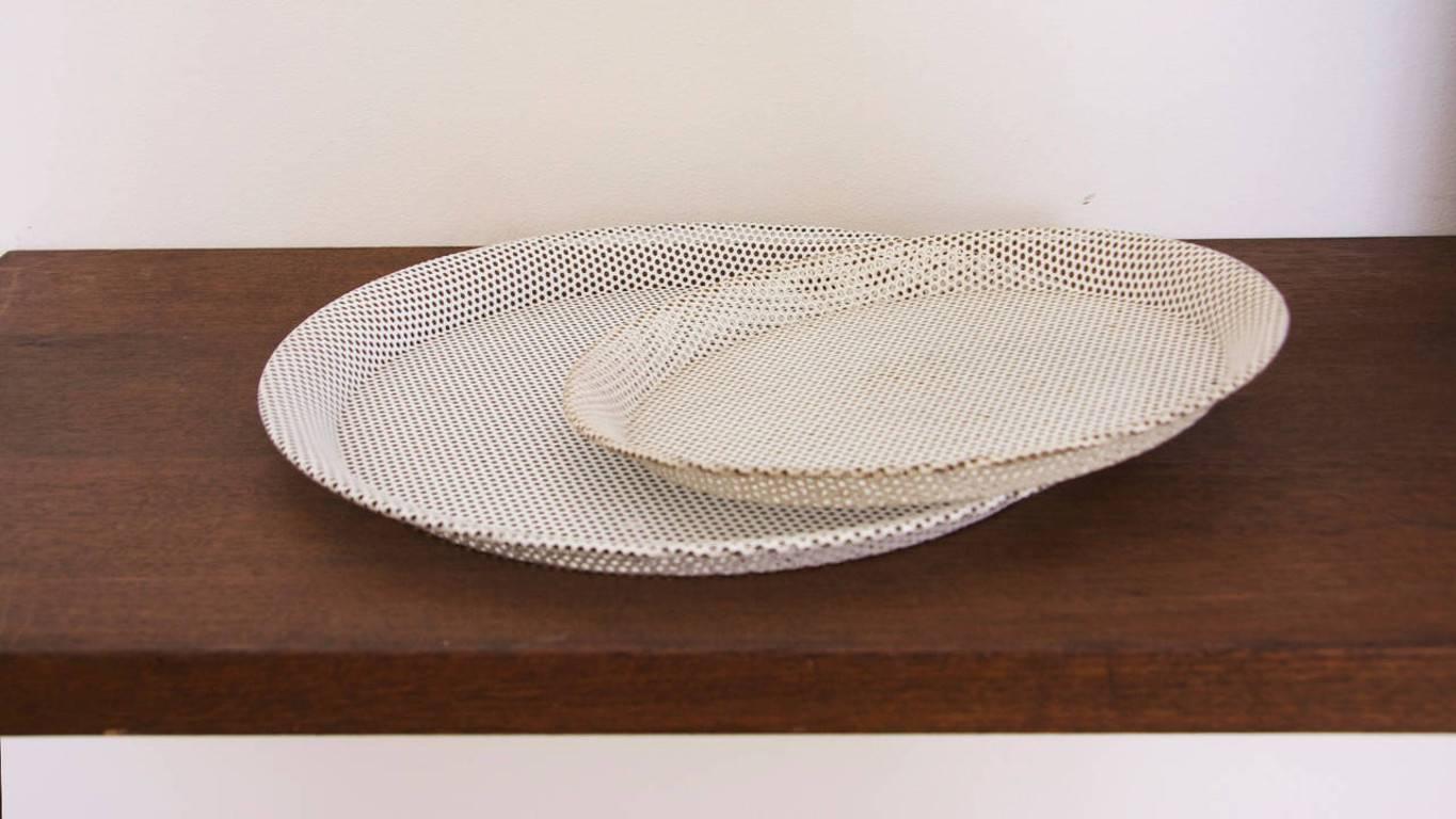 Pair of trays by Mathieu Mategot in perforated metal sheet.

