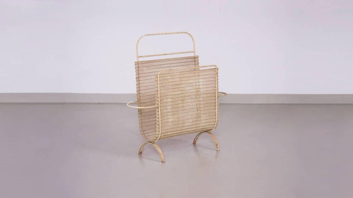 Really nice Mathieu Matégot beige Folded Magazine Stand in vintage condition.

