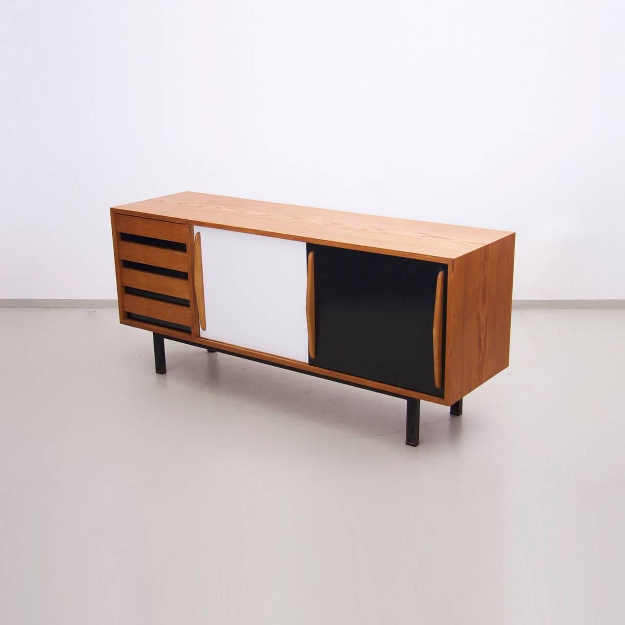 Charlotte Perriand cansado sideboard in mahogany, France, circa 1958 produced by Steph Simon, 1958 in a beautiful condition. 
From Guinea, Islamic Republic of Mauritania, Mali, Africa.