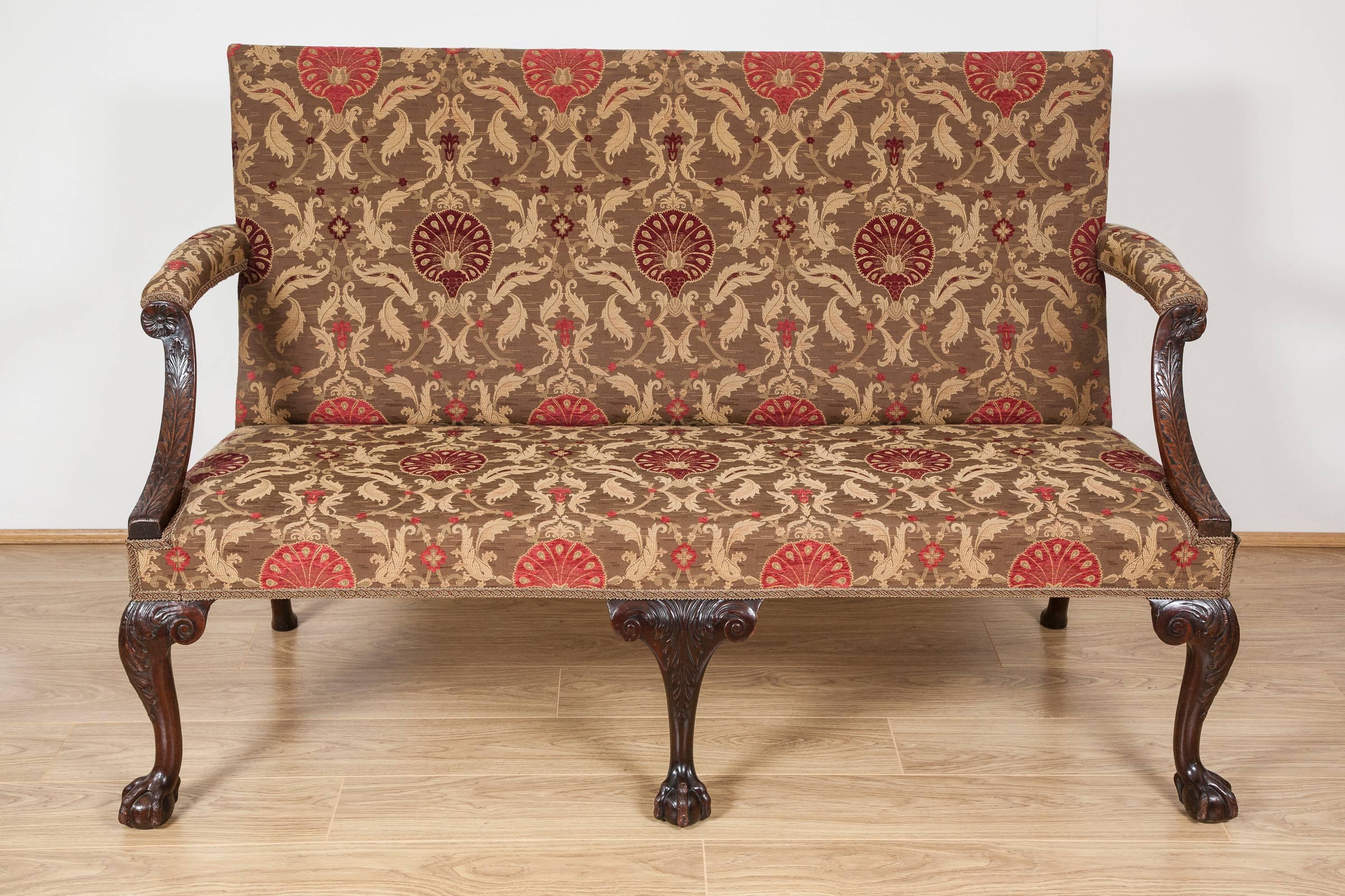 This exceptional example with beautifully carved shaped arm supports, cabriole legs and claw and ball feet.

Provenance: Stapleford Park, a Grade I listed country house near Melton Mowbray in Leicestershire. Originally the seat of the Sherard