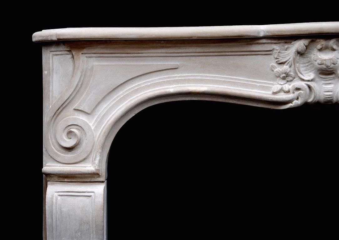 18th Century and Earlier Late 18th Century French Limestone Louis XV Mantelpiece