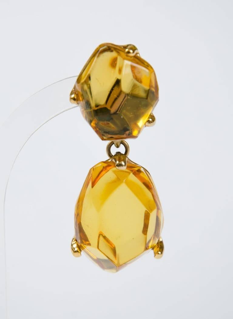 Stylish and luminous drop clip earrings that are a very wearable weight. 
Yves Saint Laurent was born in 1936, and became one of the 20th Century’s most famous and prolific fashion designers.
Finding himself at the head of  the House of Dior,