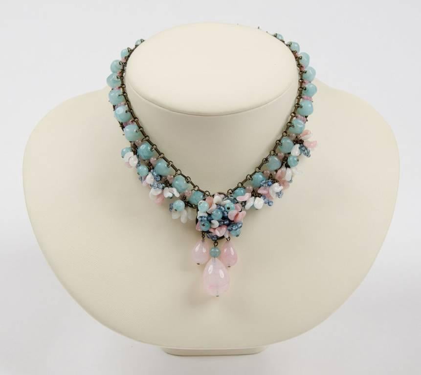 Beautiful and highly feminine glass necklace, by Louis Rousselet, in a striking and delicate colour way, made from glass and silvered metal chain with sumptuous hand made drops. 
Louis Rousselet [Paris 1892-1980) was the head of one of the most