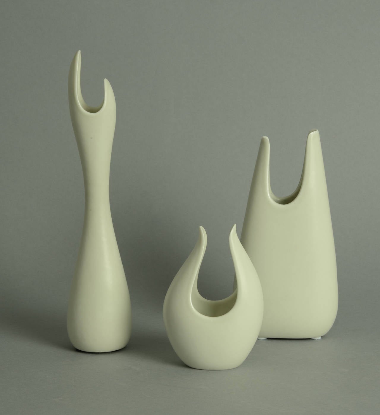 Three stoneware vases with matte white glaze, circa 1960. From the 