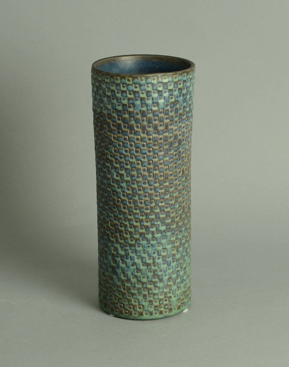 Unique stoneware vase with impressed pattern to body and matte turquoise glaze, 1963.