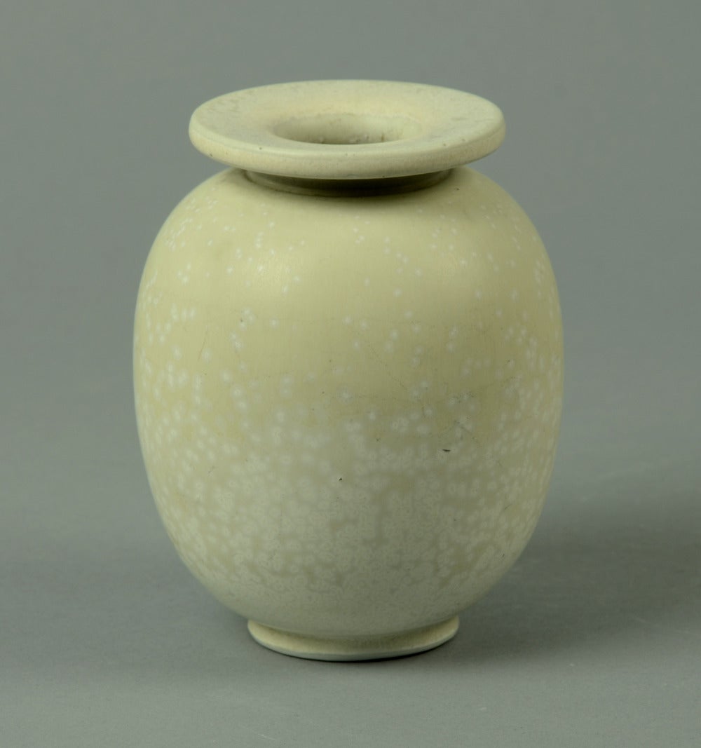 Items available separately or as a group.

1. Stoneware vase with matte white glaze and impressed lines, 1960s.
Height 6