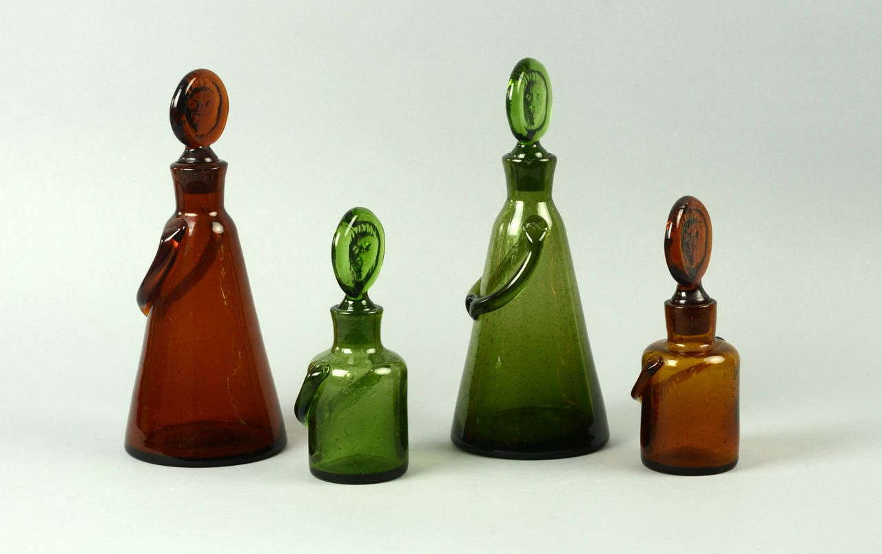 Available separately or as a group.

1. Brown glass decanter, 1950s.
Height 11 1/2