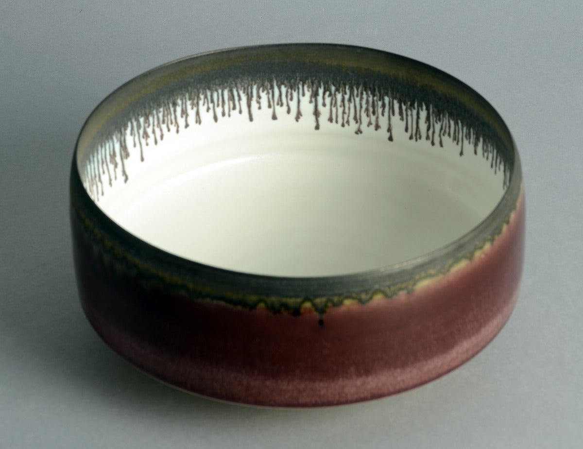 Unique porcelain bowl with glossy red and matte white and matte slightly metallic brown glaze, circa 1990-2000. Incised 