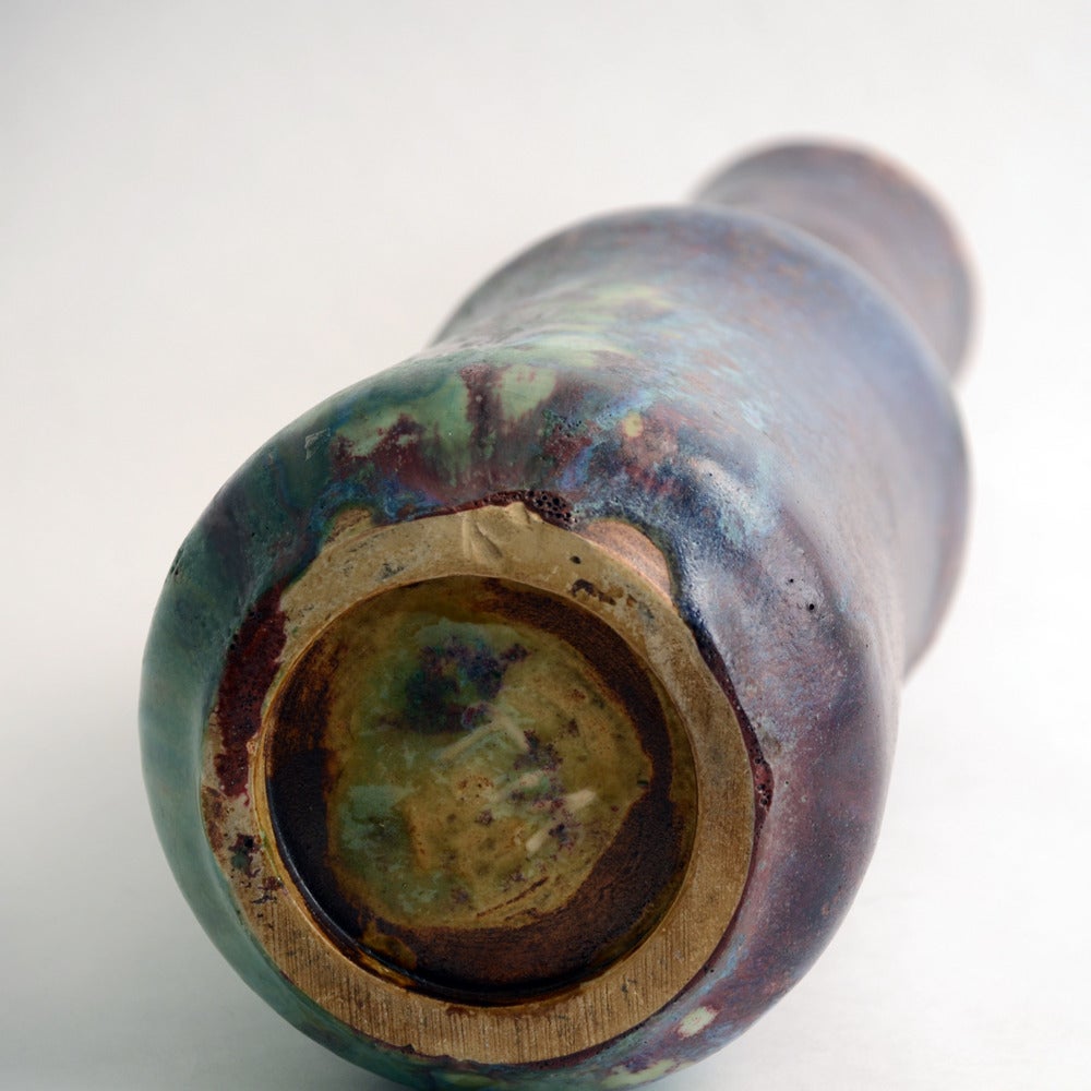 Unique stoneware vase with mottled matte glaze in purple, blue and pale green.