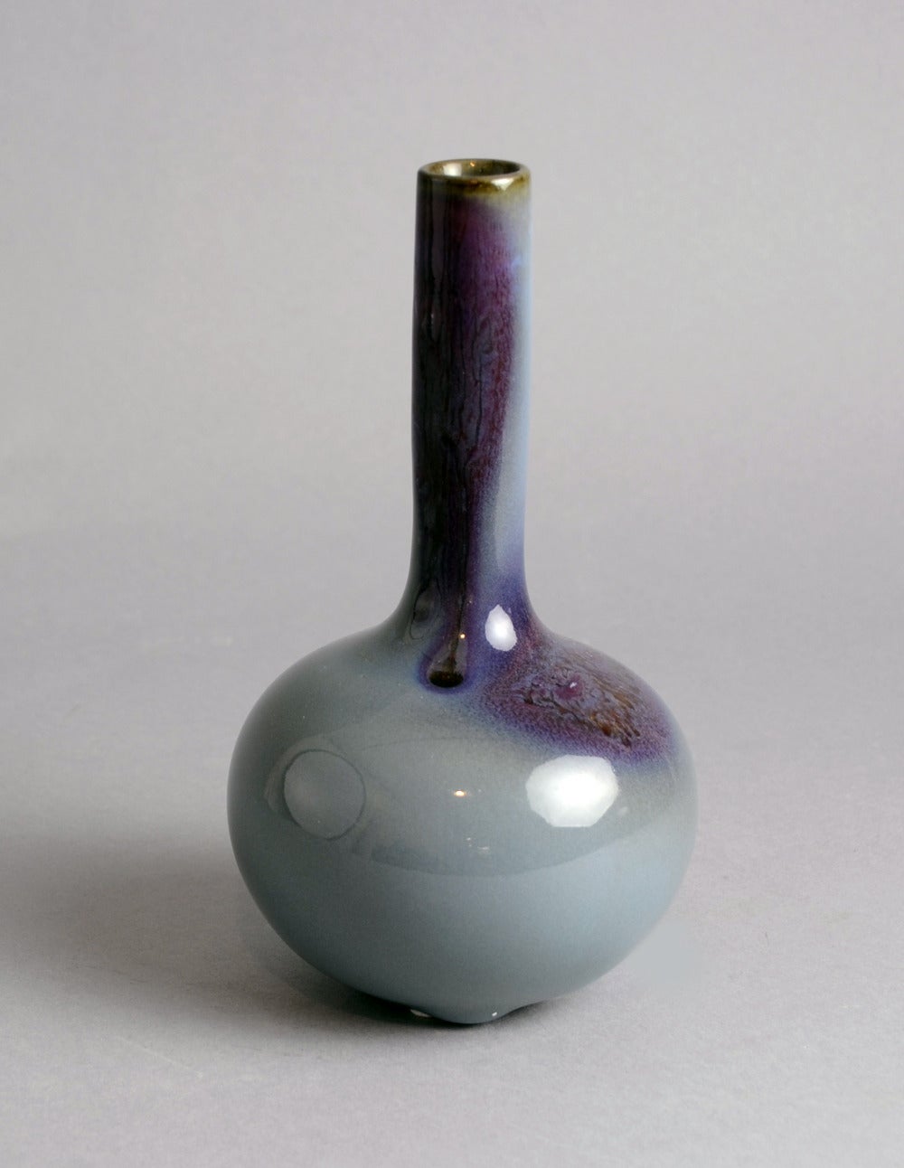 Unique stoneware vase with glossy blue and purple glaze, circa 1930s.
Height 8 1/2" (22cm), width 4 1/2" (12cm),
Incised "572", "SALTO", painted three waves.
$3800 No. N9711.