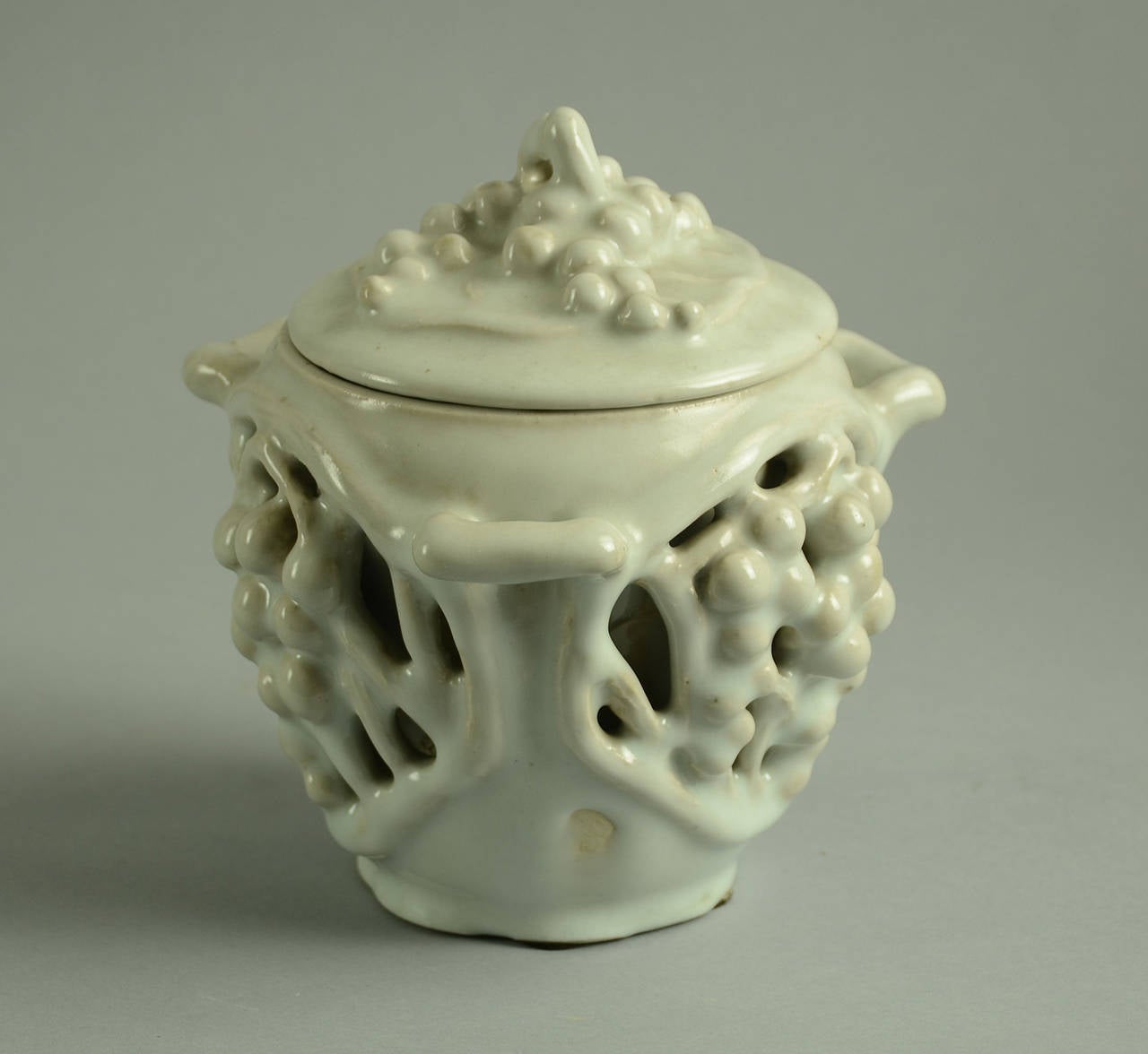 1. Unique double walled lidded jar with carved grapes and reticulated branches to body and lid, thick white celadon glaze c. 1900. Three handles. Extremely rare item.
Painted marks 