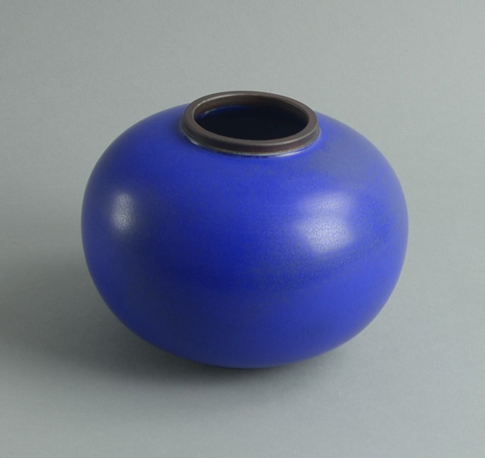 Unique stoneware vase with cobalt blue matte glaze, black rim, circa 1940.