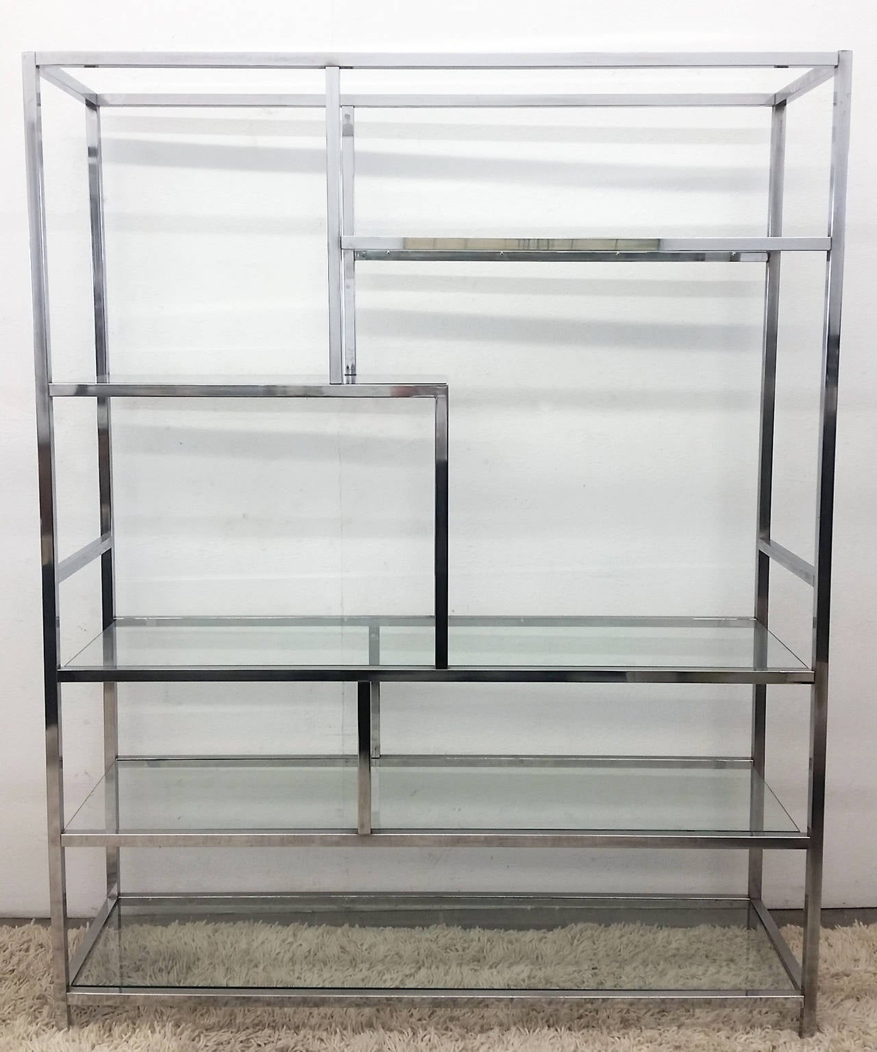 A stunning very large etagere designed by Milo Baughman.