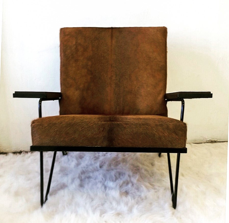 Mid-20th Century Sculptural Iron and Cowhide Lounge Chair After Raoul Guys