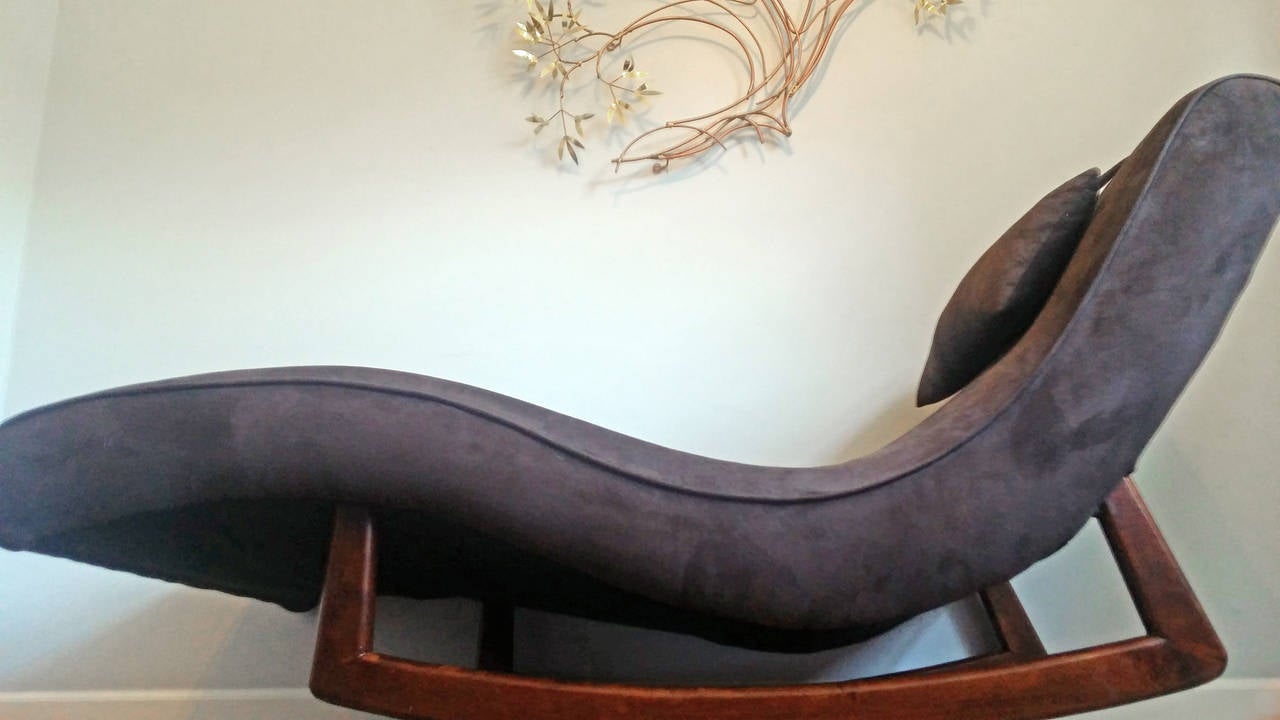 A stunning, sculptural, rocking wave chaise lounge by Adrian Pearsall for Craft Associates. This chaise is upholstered in a chocolate brown ultra-suede.