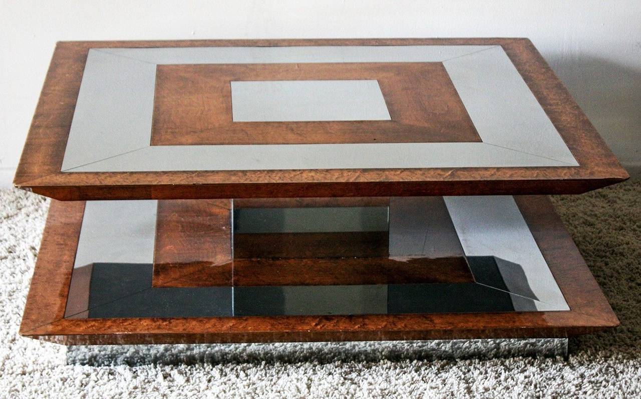 A stunning coffee table that is in the style of Paul Evans for Directional The table does not bear any original tags. 

There are some small scuffs on the chrome, and normal wear to commensurate with age. The table was well-loved and served as a