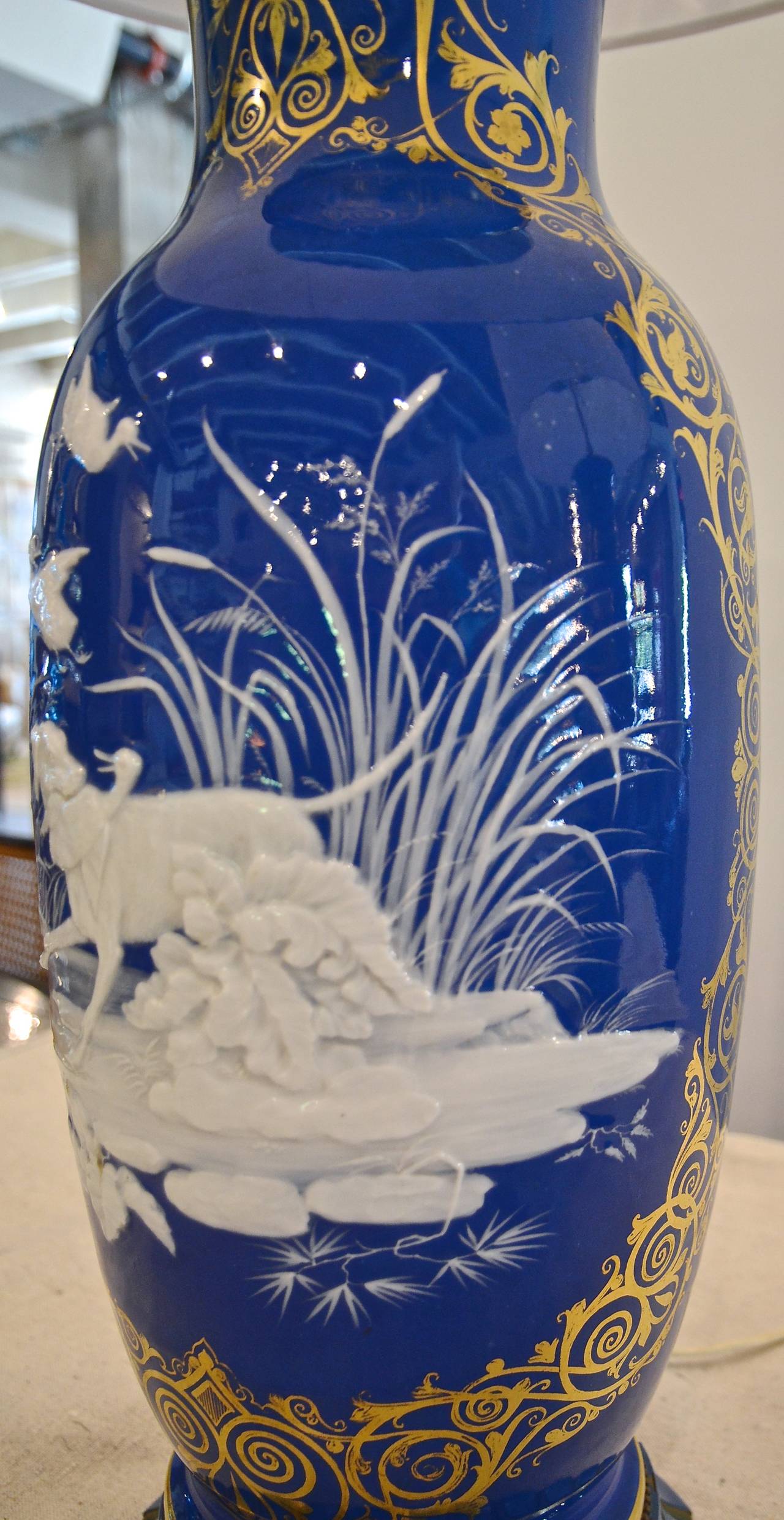 French Blue and White Påte-Sur-Påte Porcelain Lamps