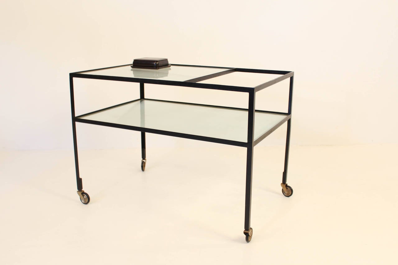 Mid-Century Modern serving trolley cart by Herbert Hirche for Christian Holzäpfel Germany 1956.
Black lacquered steel frame with original lined glass plates.
Herbert Hirche was a student at the Bauhaus in Dessau and Berlin.