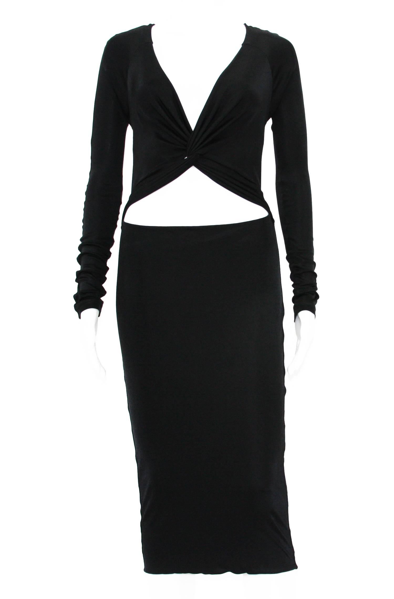 Tom Ford for Gucci 90's Sexy Cut Out Cocktail Dress
Designer size M
Black Stretch Jersey
Double Layered Skirt
Simple Slip On
Made in Italy
Excellent Condition