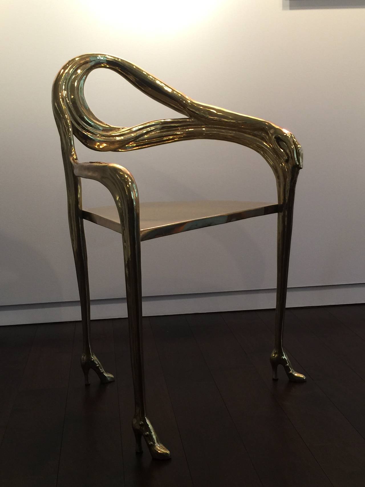 The Leda armchair was designed by Salvador Dali in the years 1935-1937 whilst he was working in collaboration with the French furniture designer Jean Michel Frank. The chair itself is made from brass castings, subsequently welded together. The