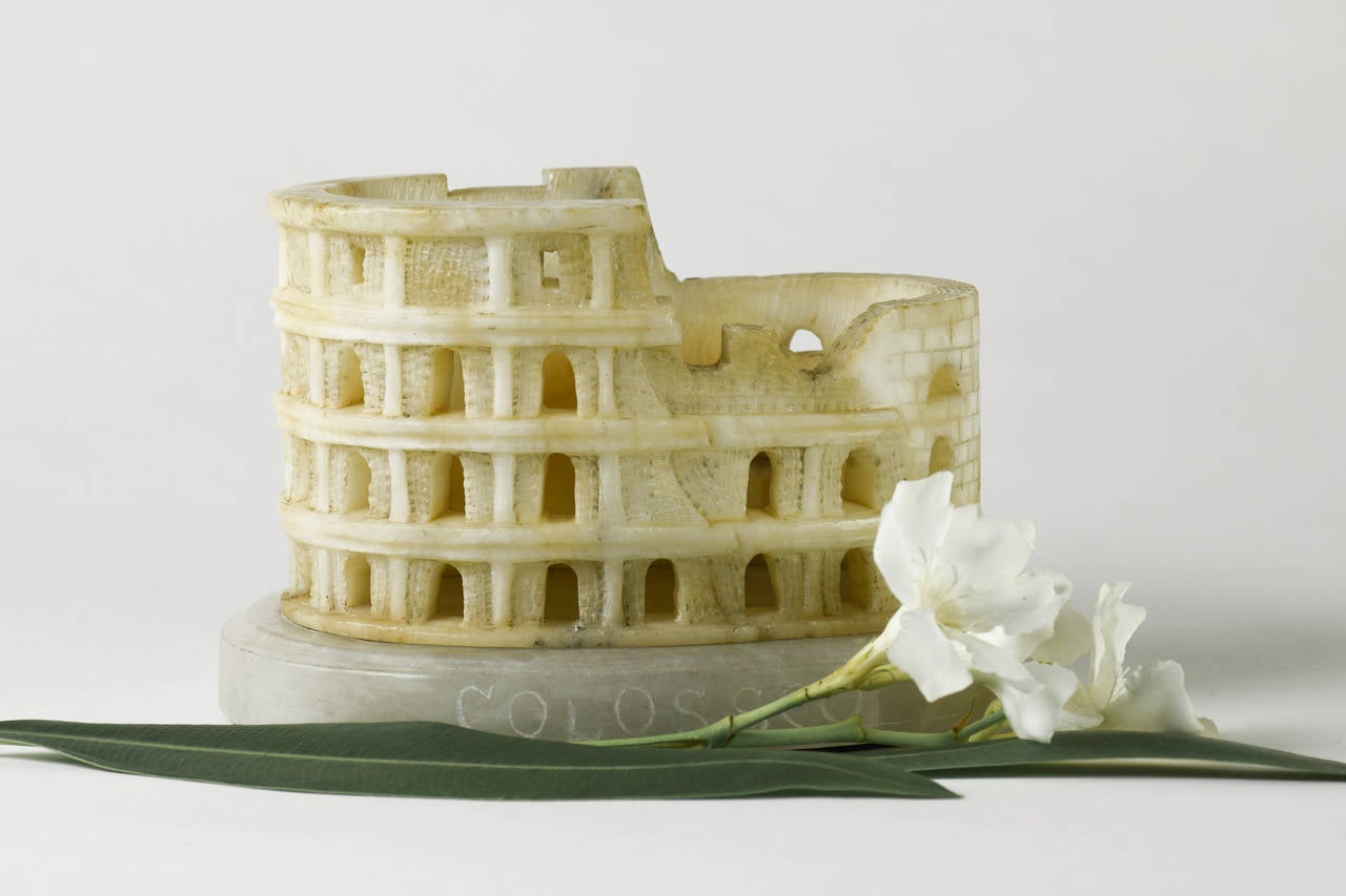This unusually large, veined alabaster model of Rome’s Colosseum dates to the second half of the 19th century and is a relatively early example of the usual colored Volterran alabaster in Rome. More familiar is the use of the stone for souvenirs in