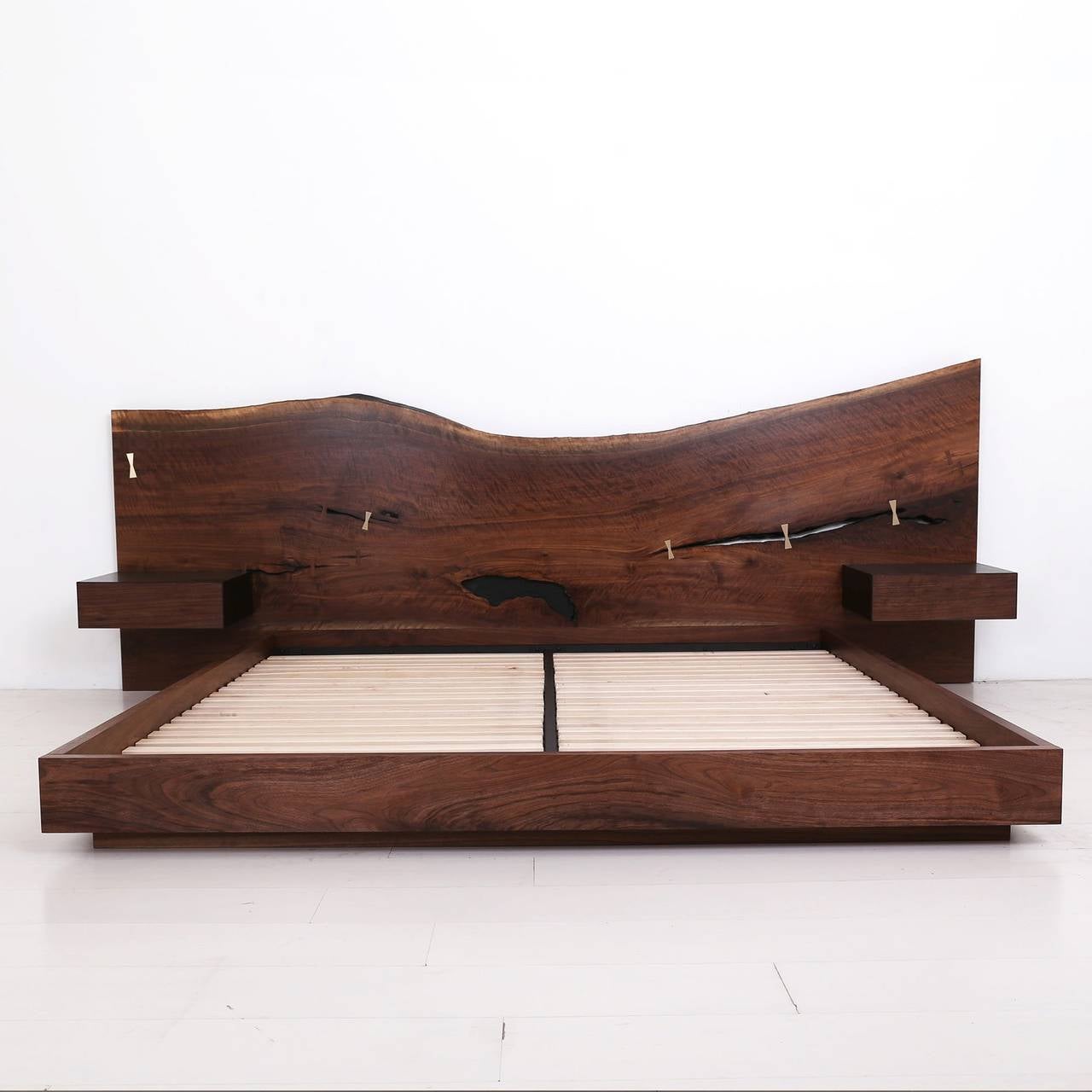 The St. Pierre bed headboard is crafted from a one-of-a-kind hardwood slab. Headboard width and height varies based on available slab dimensions. The bed frame is available in metal or wood. 

Pictured in a king-size.

Our large wood slabs are