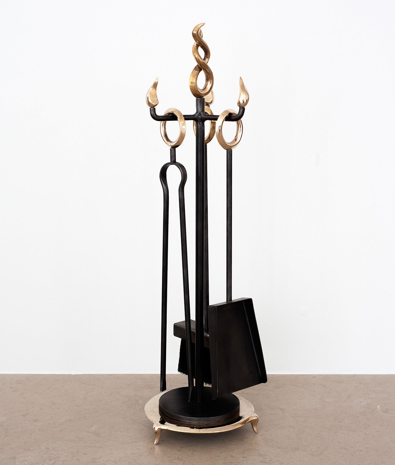 For EU buyers this piece is subject to a 20% VAT tax, which will be added to the price after the order has confirmed.  Please contact the Gallery for further information. 
A set of bronze fireplace tools with a broom, ash shovel, tongs and a