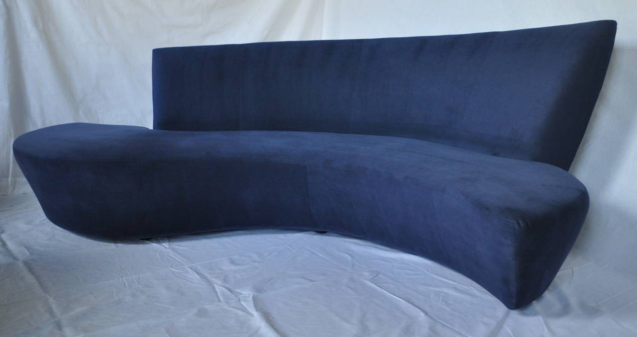 Sculptural Bilbao sofa design by Vladimir Kagan for Weiman Preview.
Original deep blue ultra suede upholstery and paper labels. Sofa includes a set of throw pillows in lighter tone upholstery. 

Measures approx 56