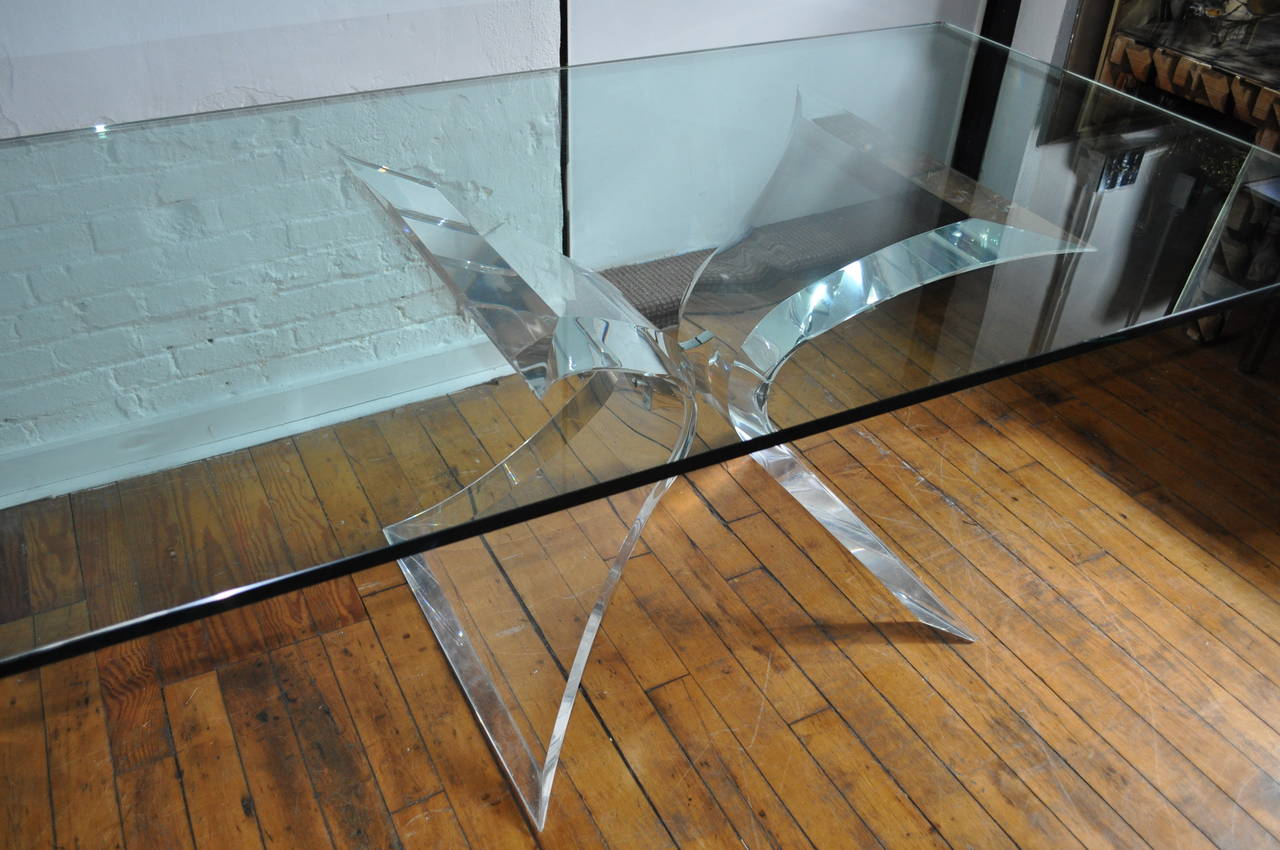 Stunning Mid-Century Modern thick Lucite, glass, and chrome dining table by Lion in Frost. Curved Butterfly 