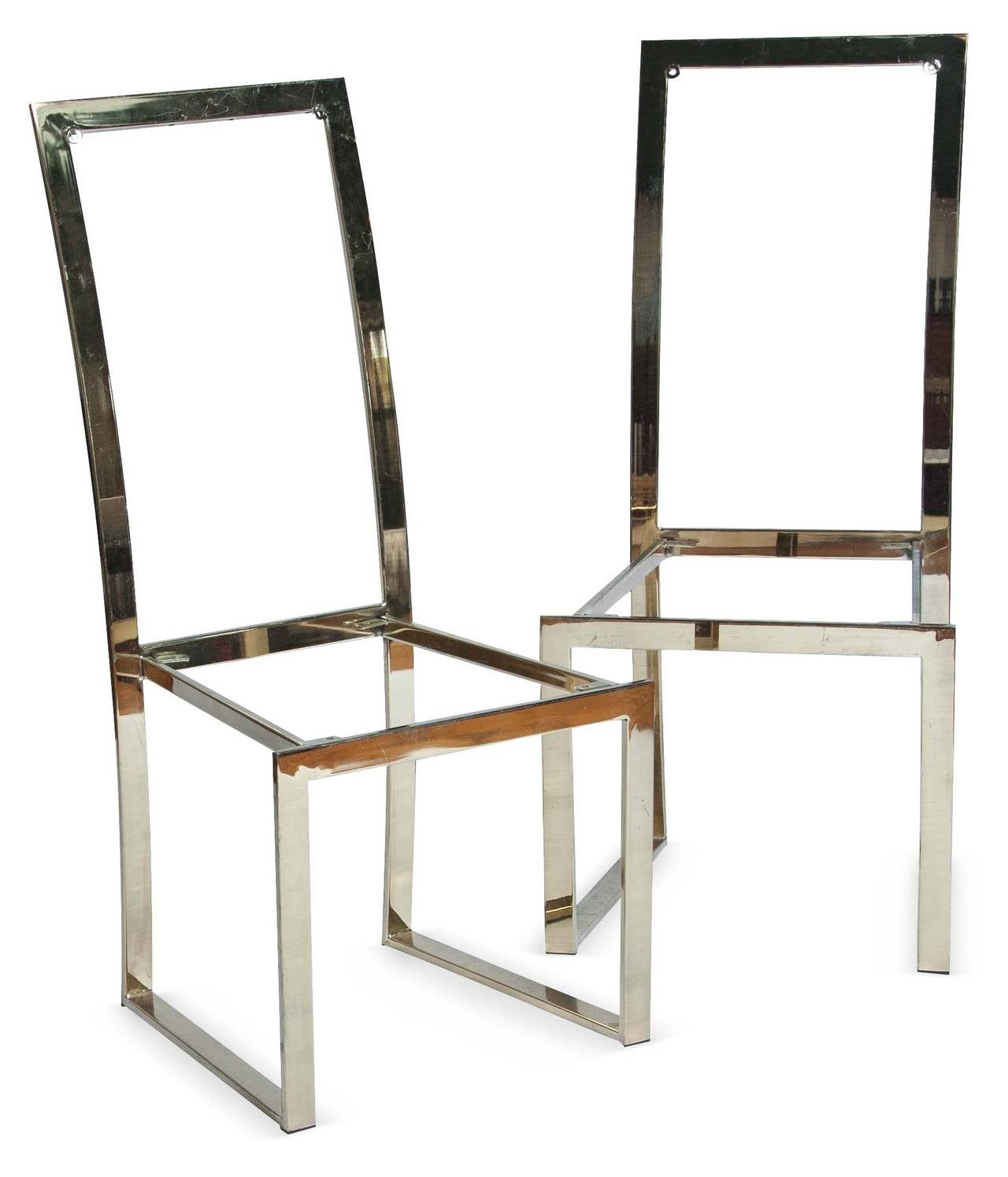 Pair of brass plated dining chair frames in the style of Milo Baughman.
